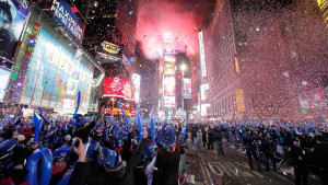 Image: Revellers cheer as confetti falls during New Year celebrations in Times Square in New York